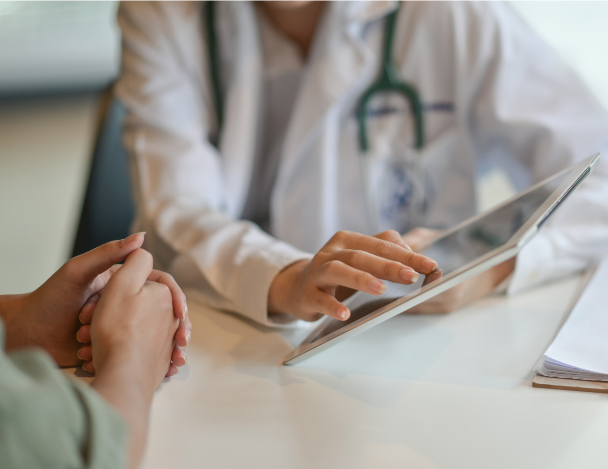 Medical professional going over results with a patient