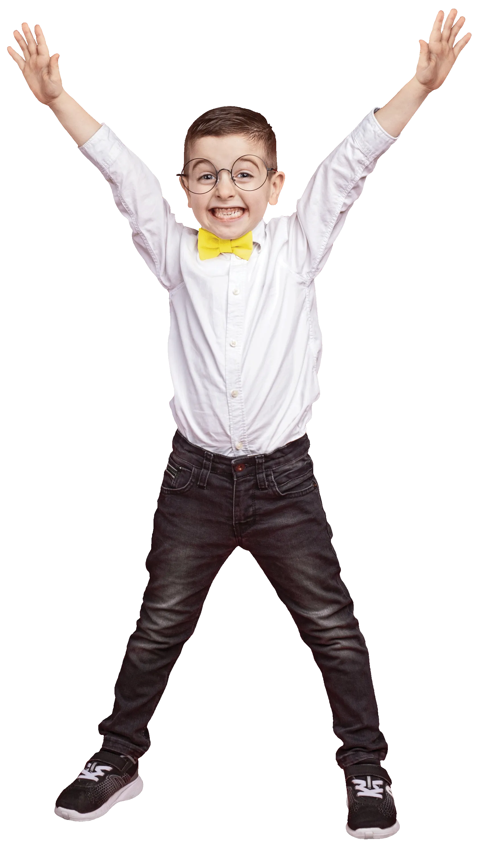 Young boy raises his hands posing for a picture