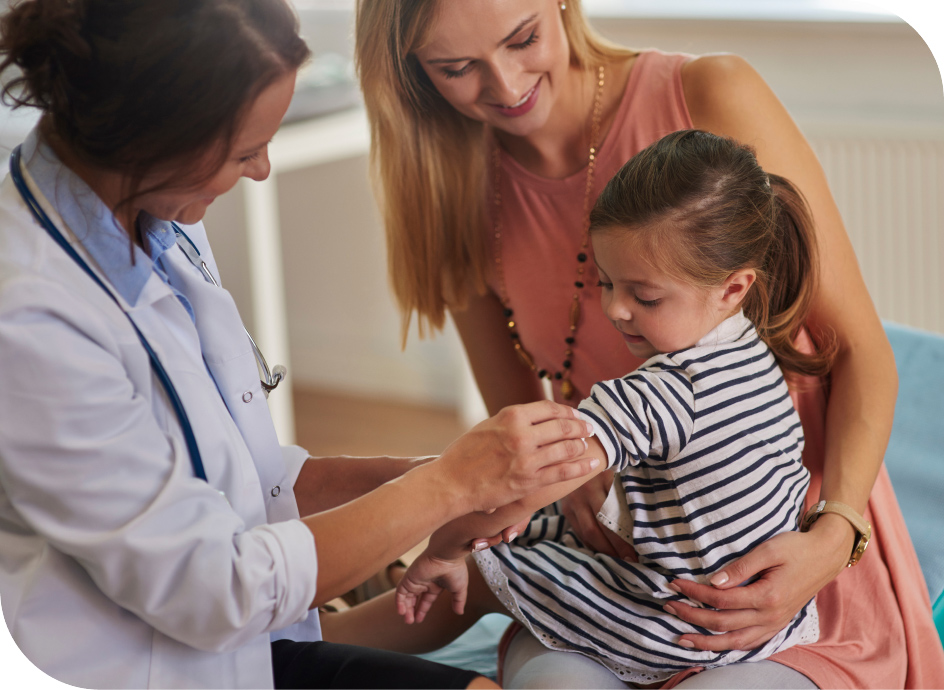 Mother with her young daughter with a Pediatrician
