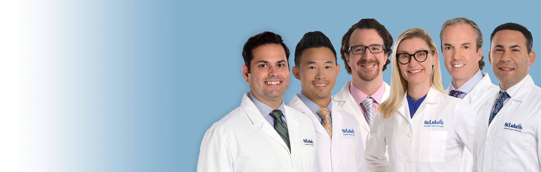 Surgeons wearing St. Luke's Plastic Surgery lab coats