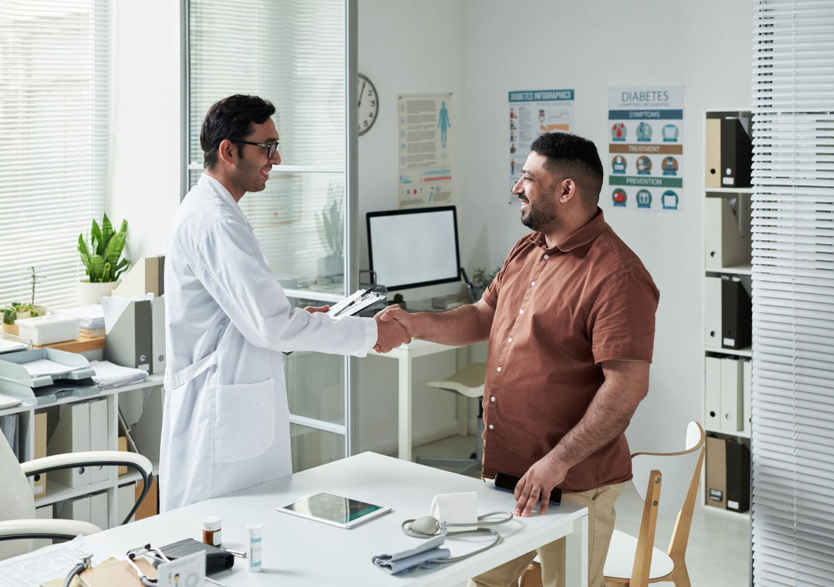Medical Professional shaking hands with a patient