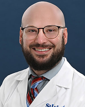 Eric J. Holaday, MD