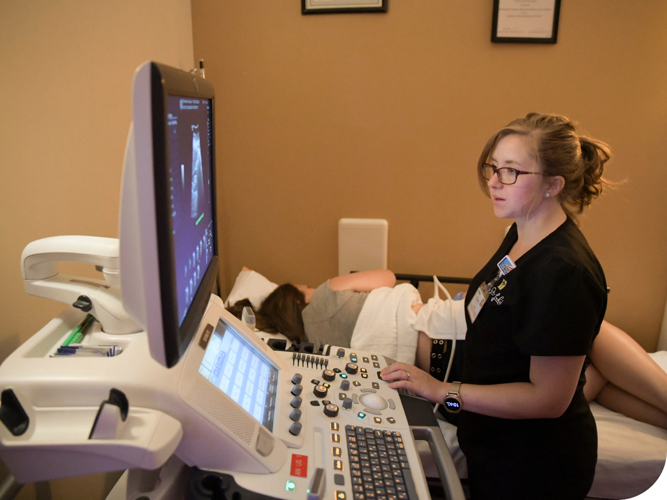 Medical Professional working on an imaging machine
