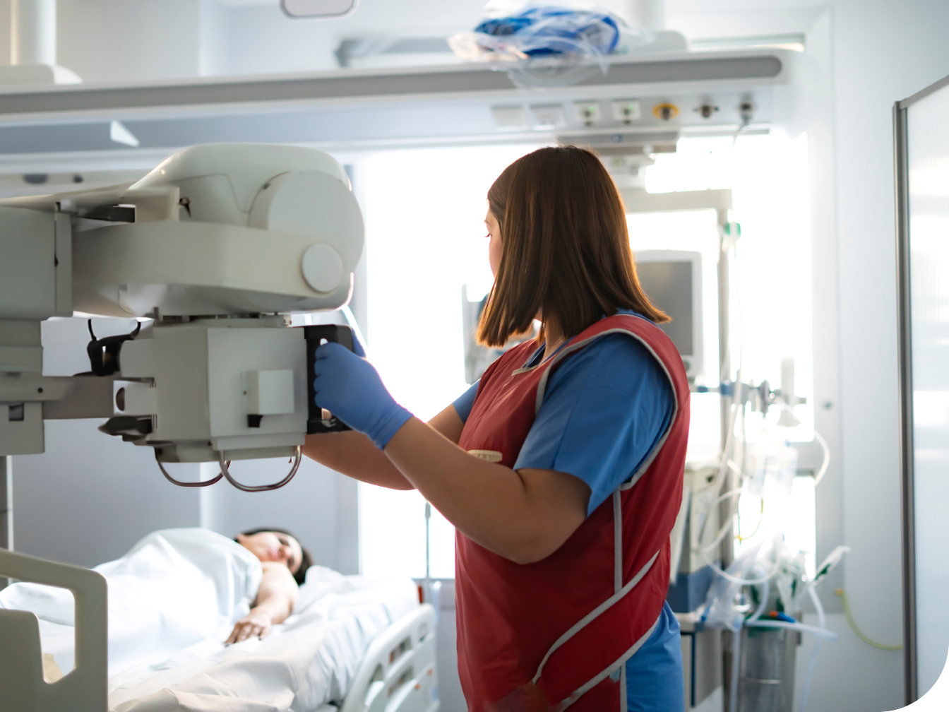 Medical Professional using a radiology machine