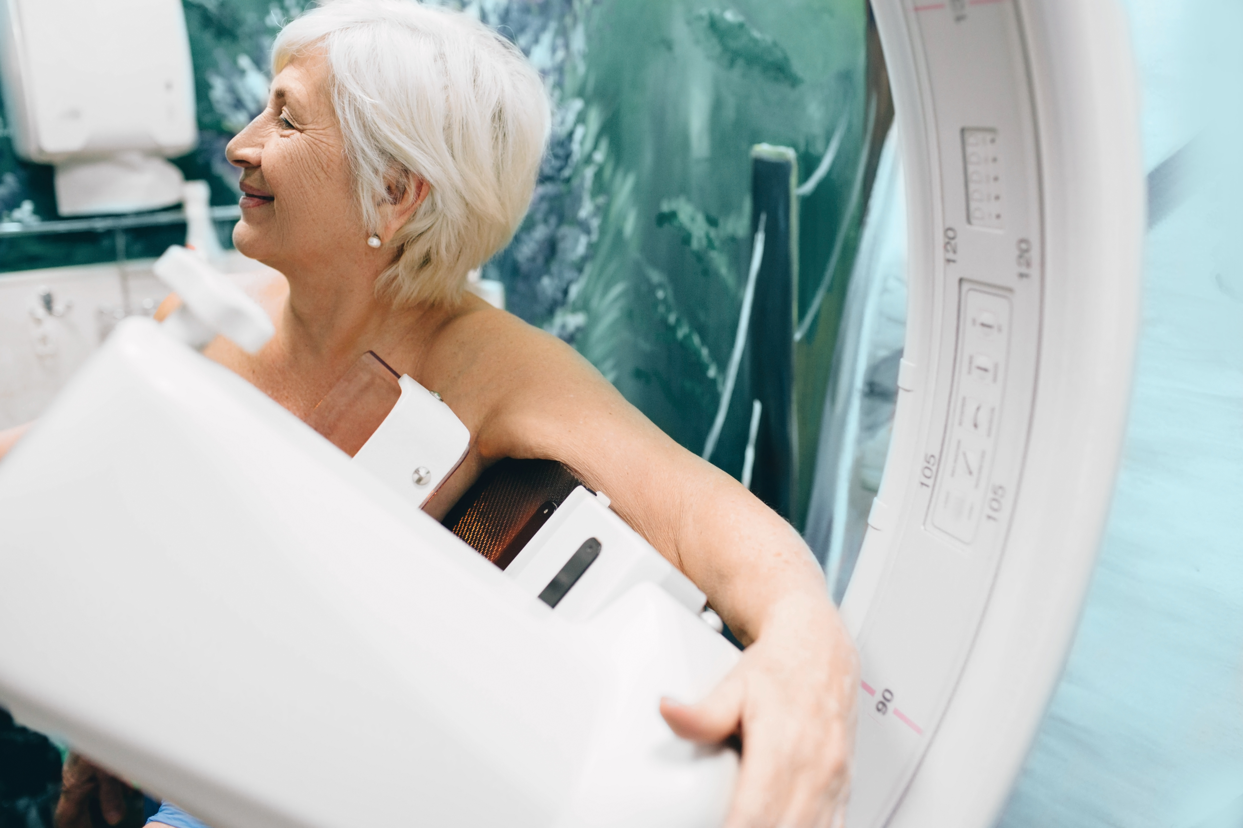 Elderly female getting a mammogram