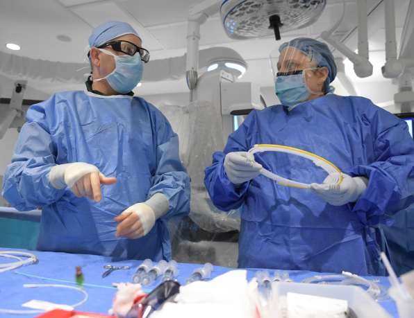 Two medical professionals in a discussion