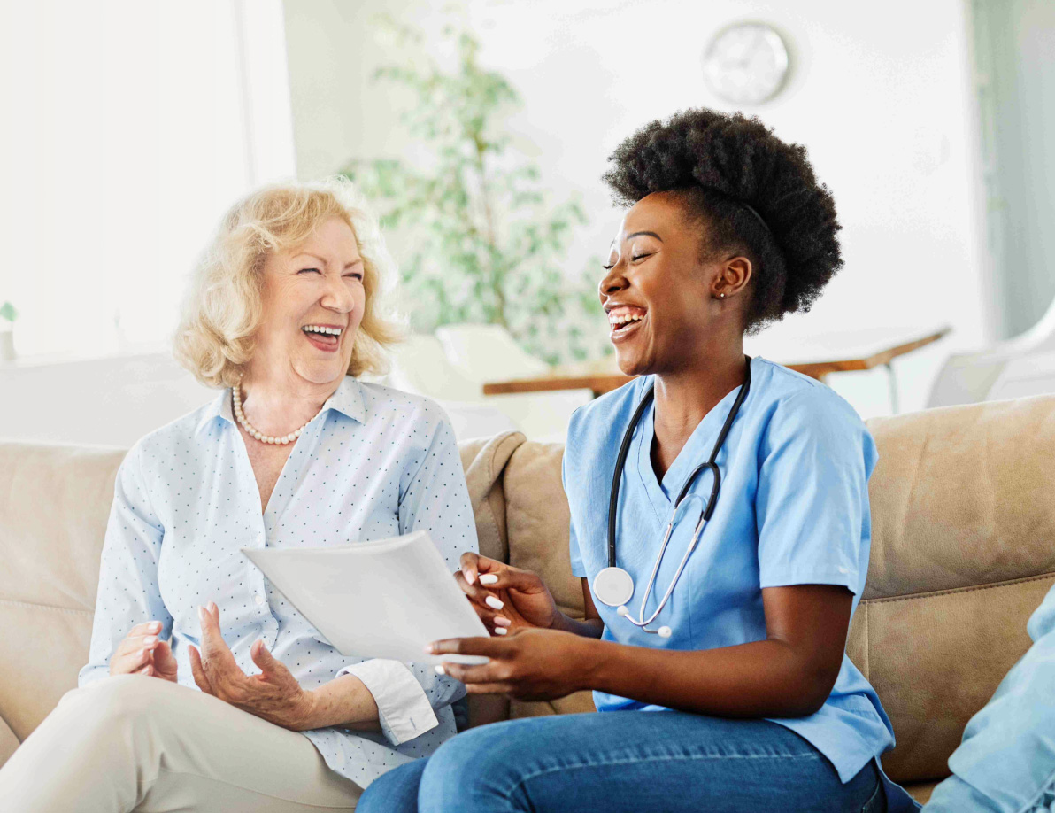 Senior talking with a care specialist