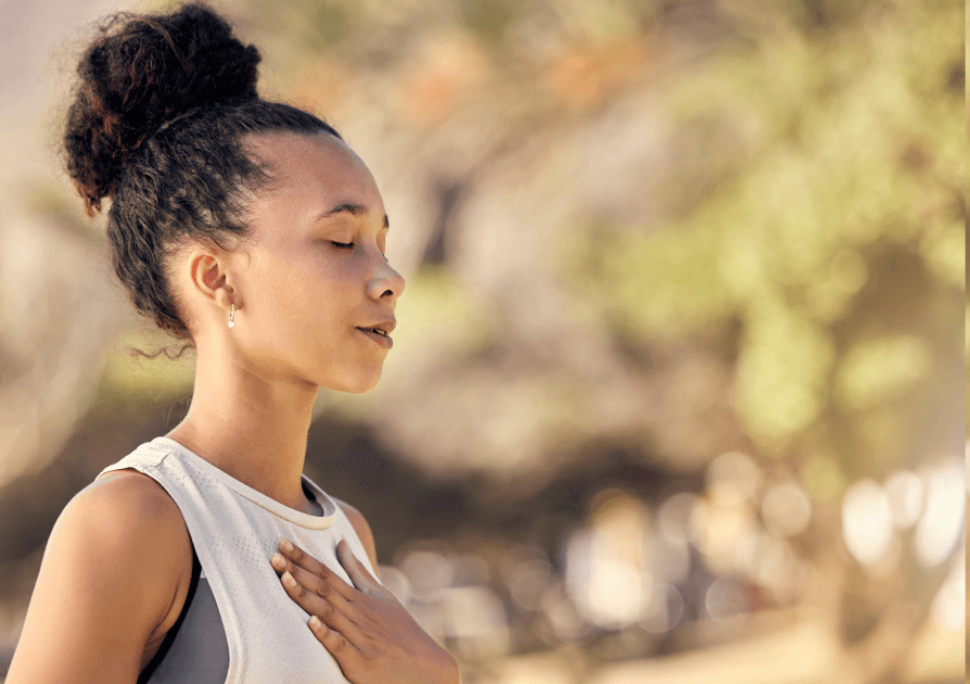 Young woman taking a moment to breath
