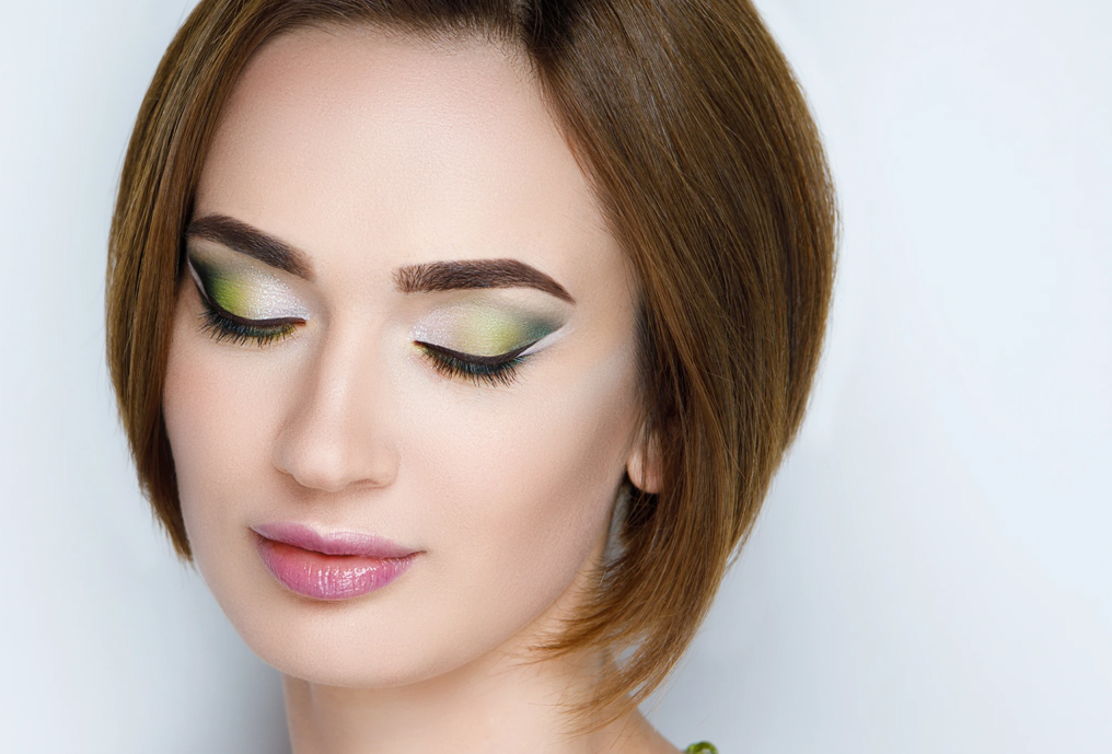 Young woman with eyes closed