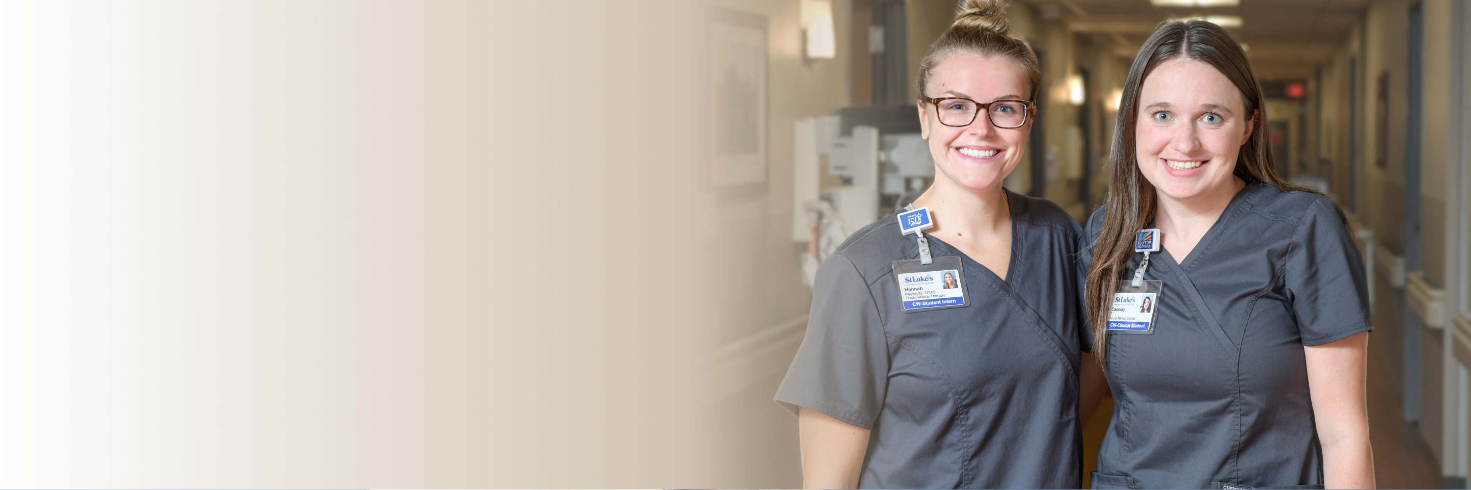 Two young female students in hospital hallway
