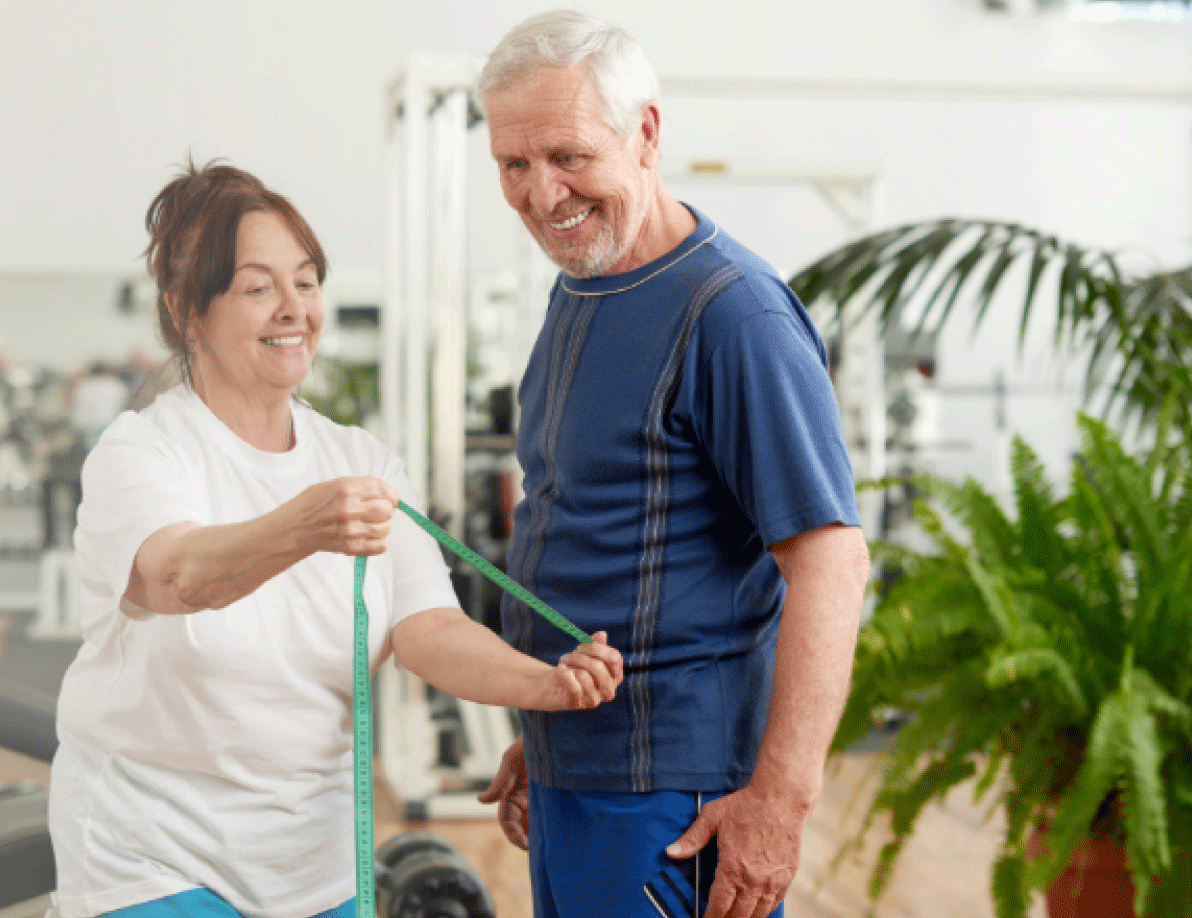 Elderly couple exercising together